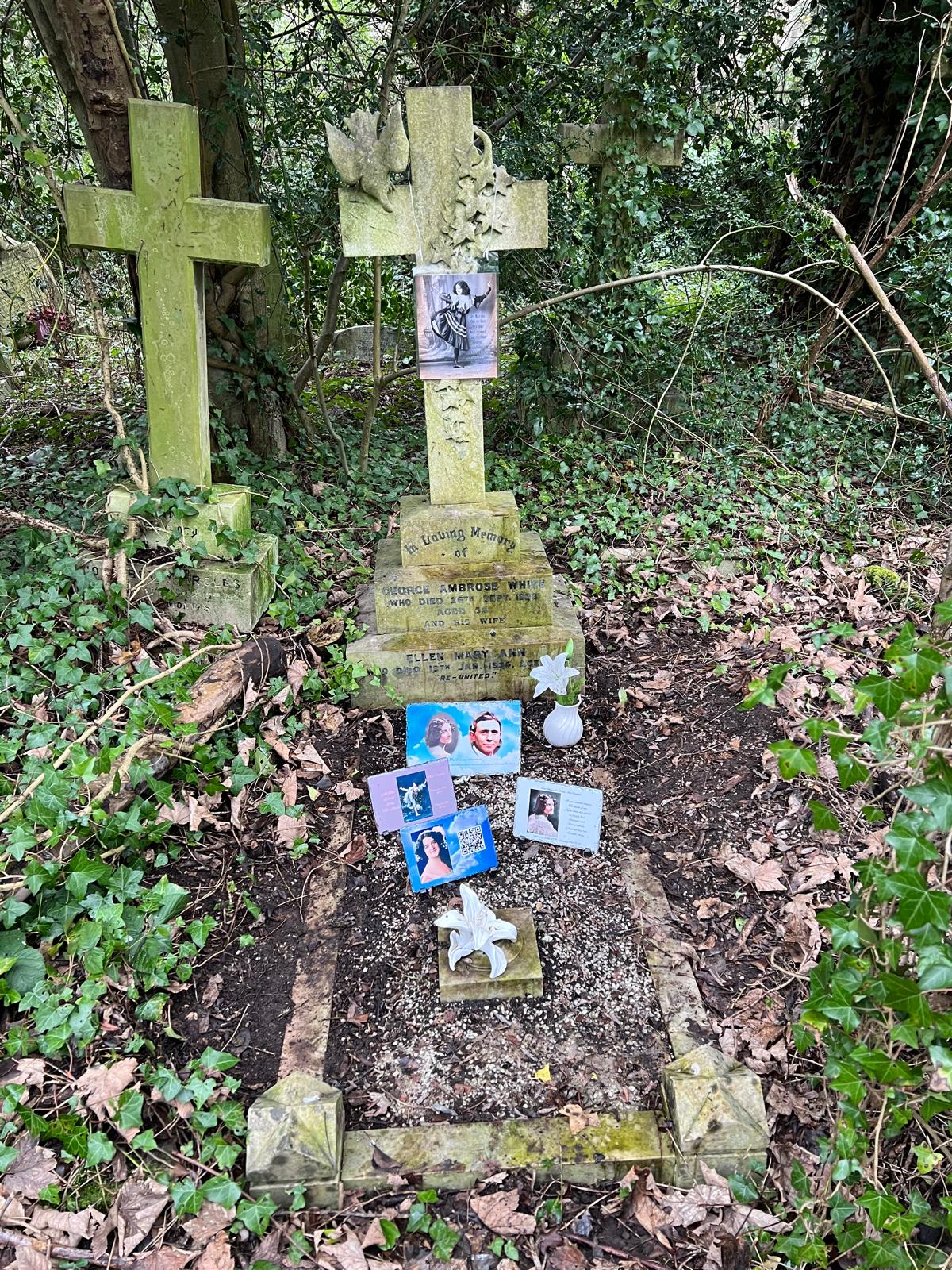 Ellen and George grave with tributes January 2025